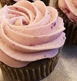 A Pink Cupcake With Frosting