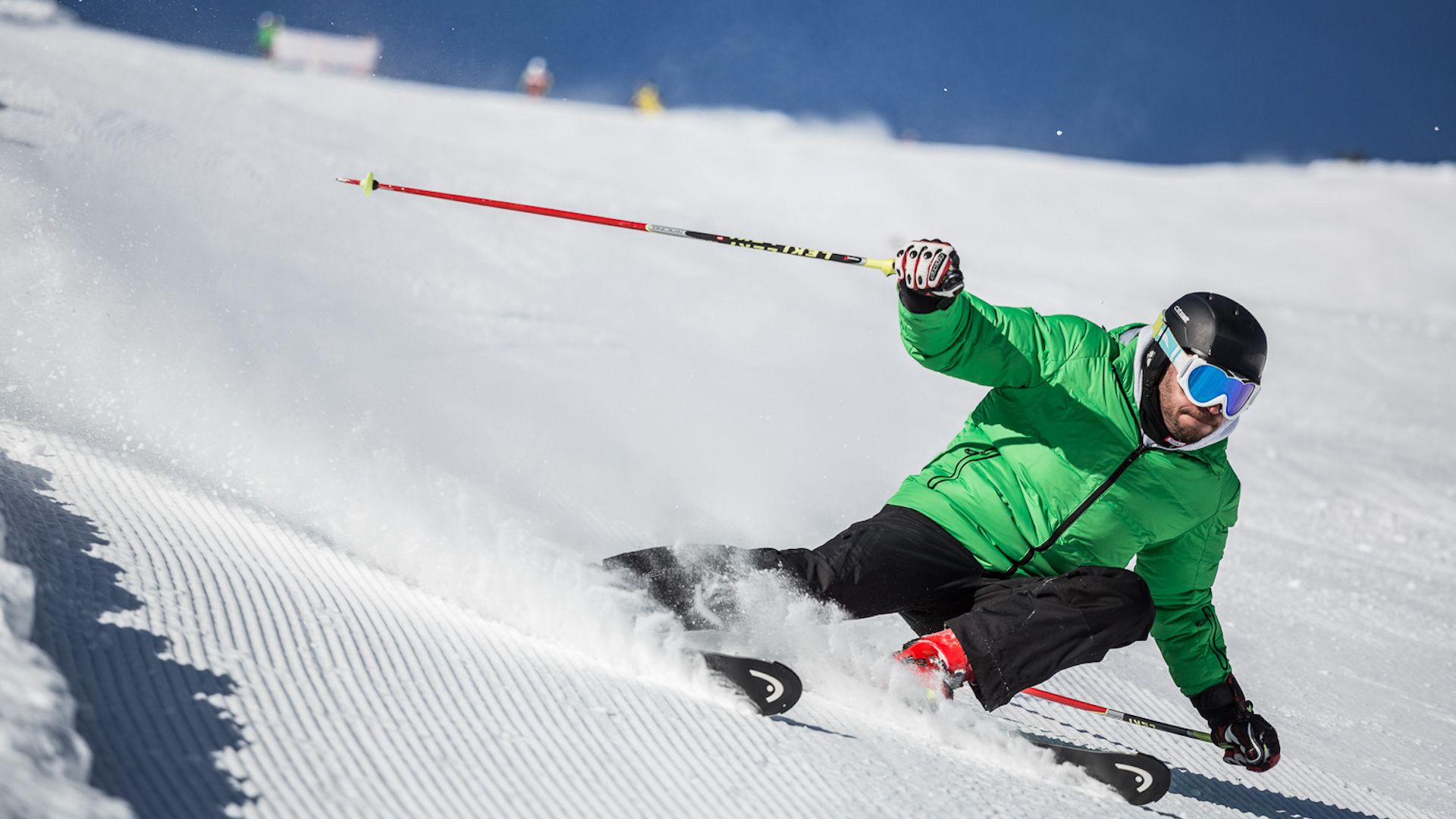 A Skier Going Down A Slope