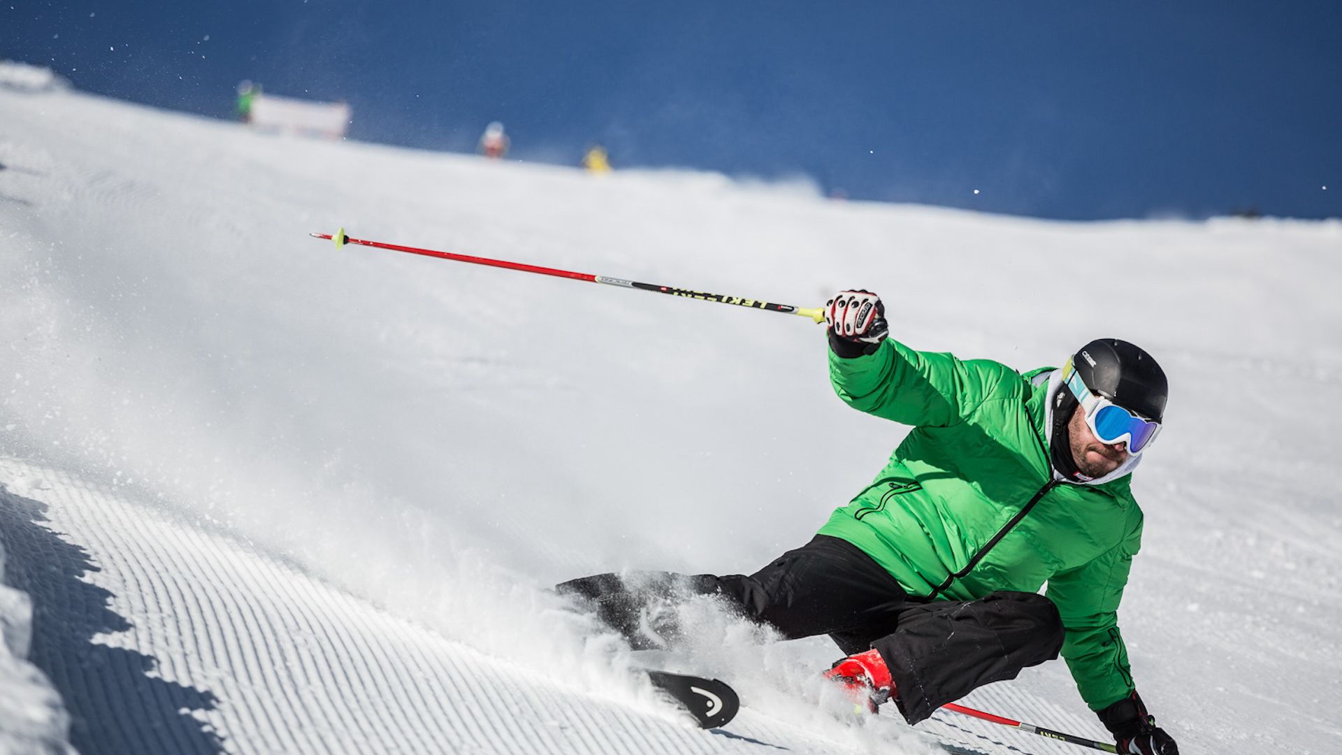 A Skier Going Down A Slope